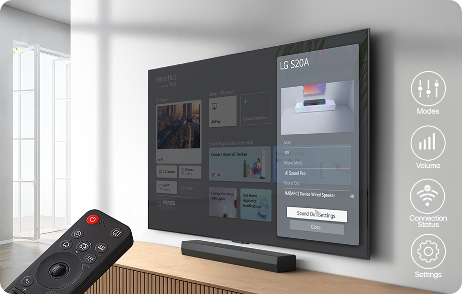 거실에 벽걸이 TV가 설치되어 있으며, 화면에는 "Home Hub" 인터페이스가 표시되고 있습니다. 화면에는 "TV Inputs", "Mobile / Bluetooth", "Smart Ways to Use Home Hub" 등의 메뉴가 보입니다. "LG S20A"라는 텍스트와 함께 음향 설정 메뉴가 열려 있으며, "Mute", "AI Sound Pro", "Sound Out", "Sound Out Settings" 등의 옵션이 있습니다. TV 옆에는 모드, 볼륨, 연결 상태, 설정을 나타내는 아이콘들이 세로로 배열되어 있습니다. TV 앞에는 리모컨이 놓여 있으며, 리모컨에는 다양한 버튼이 있습니다. 창문을 통해 자연광이 들어오고 있습니다.
